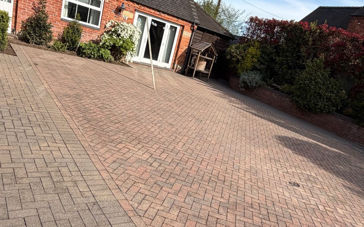 A block paved driveway in Staffordshire after pressure washing, back to the colour the blocks were laid in
