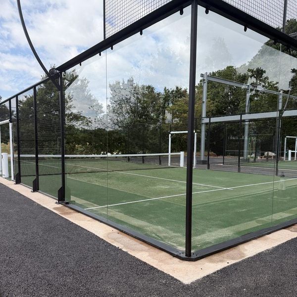 A padel court with the glass cleaned, seen clearly through both panes